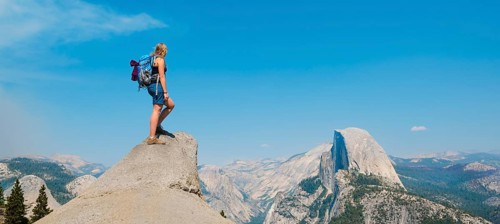 Hiker standing on a cliff