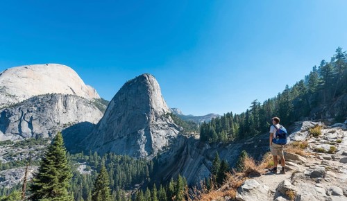 Walker looking on Liberty Cap