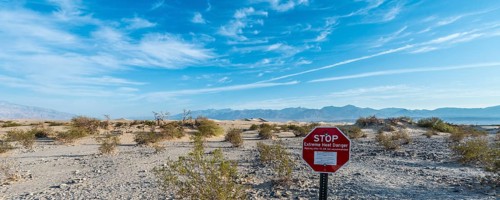 Sign lettering "STOP Extreme Heat Danger" warning of heat