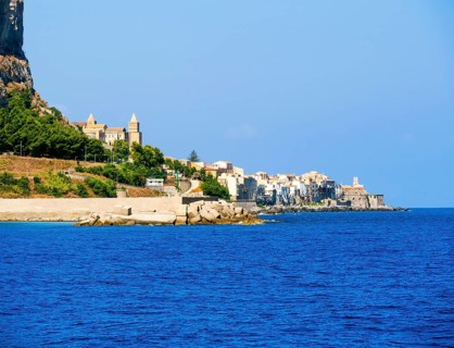 The town of Cefalu at the foot of the Rocca di Cefalu rock