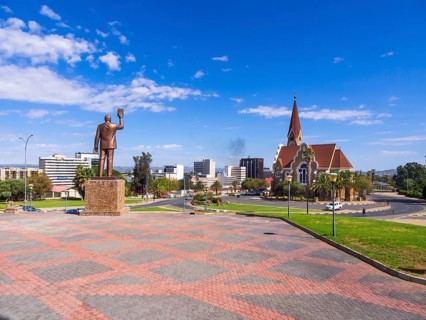 Statue of Dr. Sam Nujoma with Church of Christ