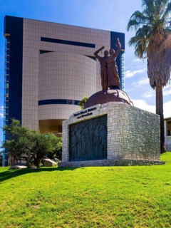 Independence Monument in front of Independence Memorial Museum