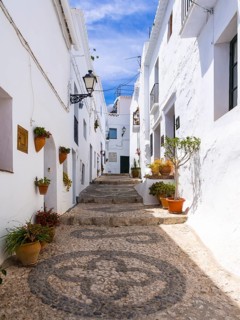 White houses in narrow alleyway