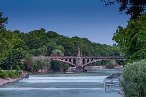Maximiliansbrucke bridge over the Isar at dusk