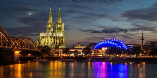 City-panorama of Cologne at dusk