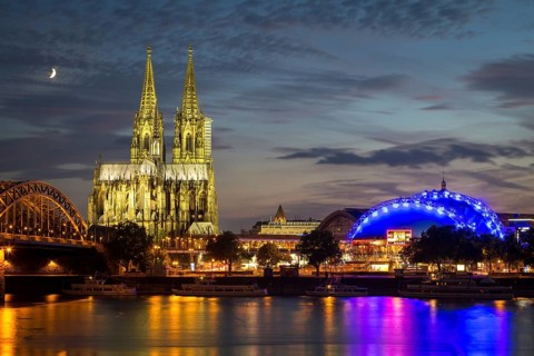 City-panorama of Cologne at dusk