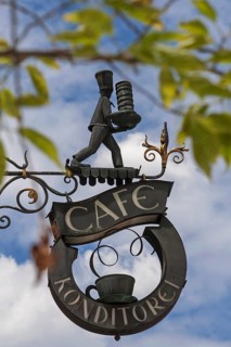 Wrought iron signboard of a pastry shop