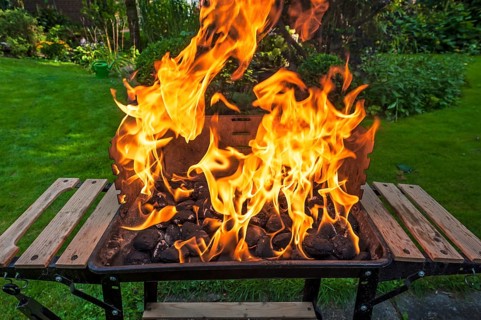 Flames on a charcoal grill