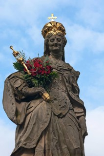 Statue of Empress Kunigunde with a bunch of roses
