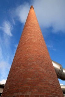 Old brick factory chimney