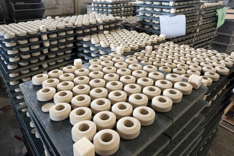 Finished steatite parts on slabs in a former steatite factory