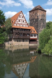 Old timbered houses and hanging tower