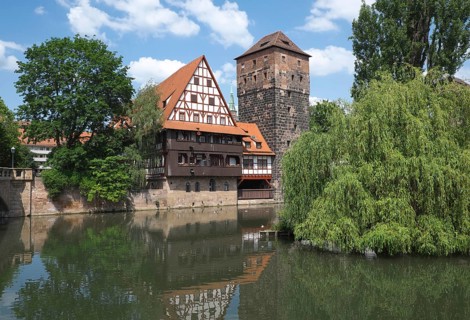 Old timbered houses and hanging tower