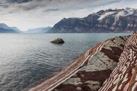 Unfolded coloured rock strata