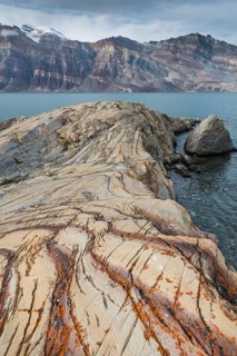 Unfolded coloured rock strata
