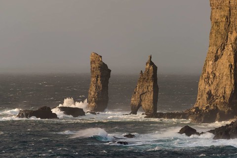 Sea stacks Risin og Kellingin in the evening light