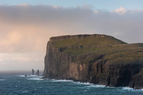 Sea stacks Risin og Kellingin in the evening light