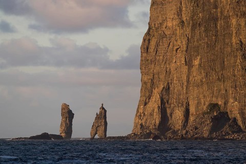 Sea stacks Risin og Kellingin in the evening light