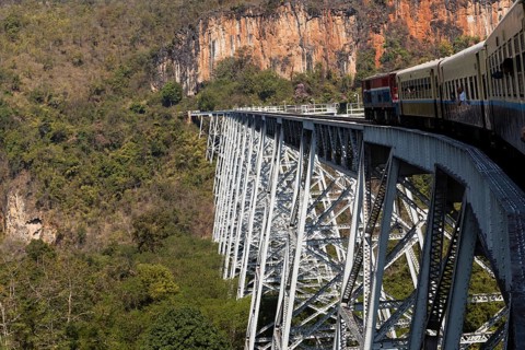 A train is crossing the famous Gokteik Viaduct