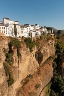 Whitewashed houses atop El Tajo Gorge Canyon