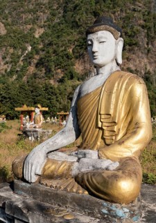 Buddha statue in Lumbini Garden under Mt Zwegabin