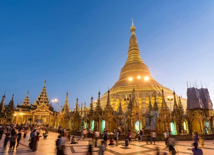 Crowds of visitors at Shwedagon Pagoda at dawn