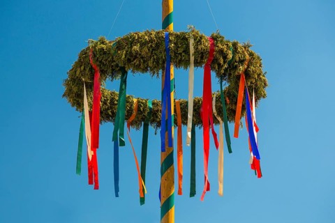 Maypole with colorful ribbons