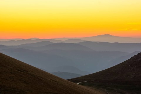Views of the Sibillini Mountains at sunset from Castelluccio di Norcia