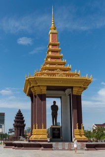 Statue of Norodom Sihanouk in front of Independence Monument
