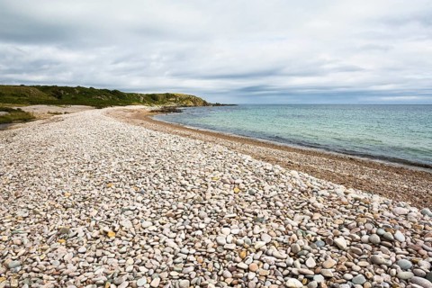 Pebble beach at end of Claggain Bay