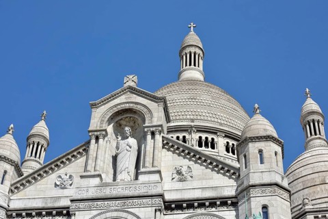 Main portal with statue of Christ