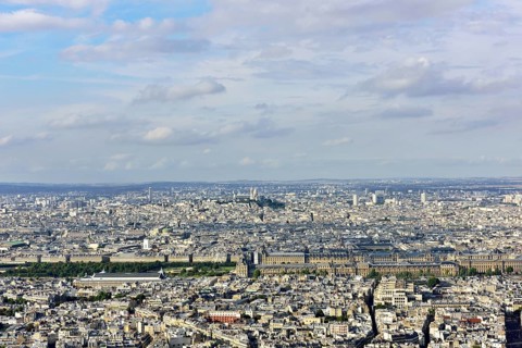 Cimentiere de Montparnasse and city centre with Louvre and Montmartre