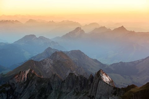 Evening mood at the blue hour on the Santis with a view of the Alps of Eastern Switzerland
