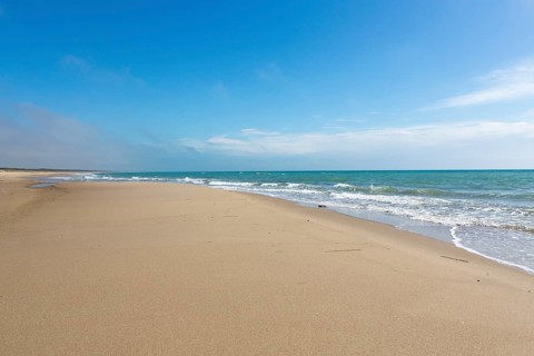 Empty sandy beach in Taranto