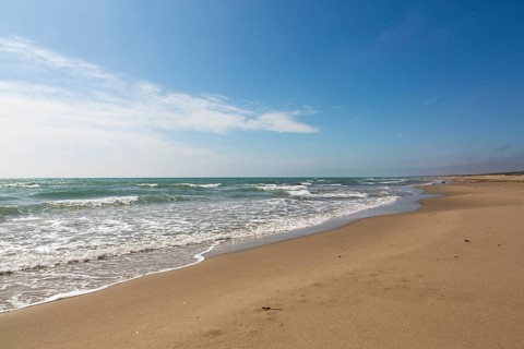 Empty sandy beach in Taranto