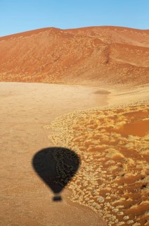 Shadow of a hot-air balloon in the Namib Desert