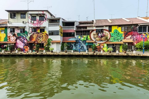 Brightly painted house fronts along the Malacca River