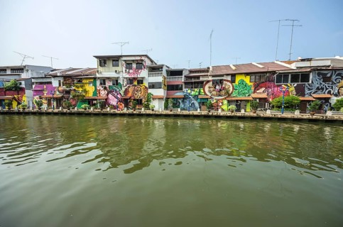 Brightly painted house fronts along the Malacca River