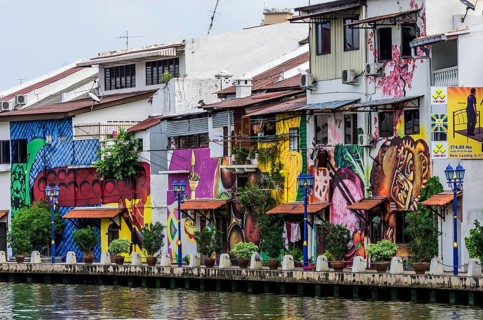Brightly painted house fronts along the Malacca River