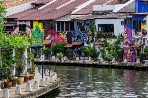 Brightly painted house fronts along the Malacca River