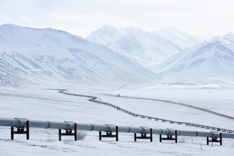 Oil pipeline from Prudhoe Bay to Valdez in the Arctic winter along the Dalton Highway
