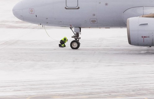 Aircraft check in winter on snow-covered runway