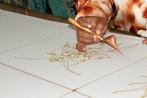 Worker in a batik manufacture in Kuala Lumpur