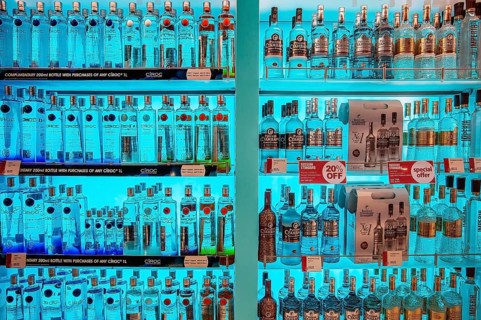 Shelf with vodka bottles
