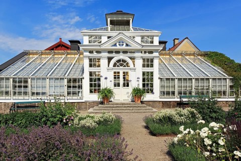 Greenhouse with flower beds in the castle garden of Gripsholm