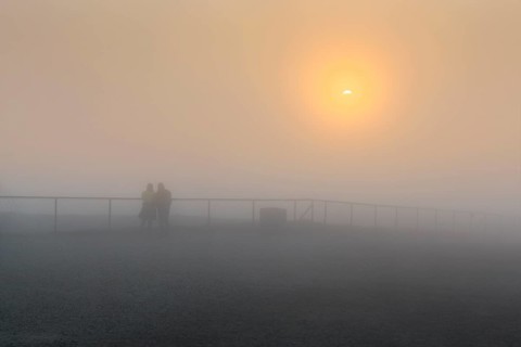 midnight sun in fog