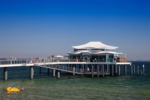 Seeschlosschenbrucke bridge with Japanese teahouse on Timmendorfer beach