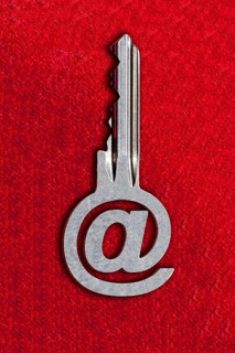 @ sign key against a red background