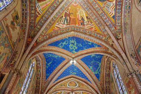 Ceiling vaults decorated with frescoes in the upper church of San Francesco Basilica