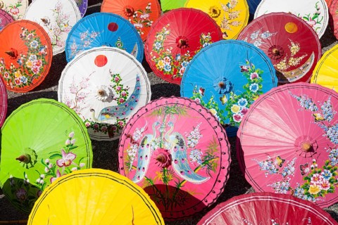 Handmade paper parasols drying in the sun at an umbrella factory in Bo Sang